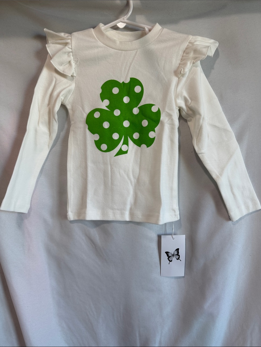 Girls Cream Long-Sleeve Ruffle Shoulder Top with Green Shamrock